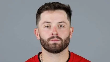 Tampa Bay Buccaneers quarterback Baker Mayfield looking directly at the camera wearing his team jersey.